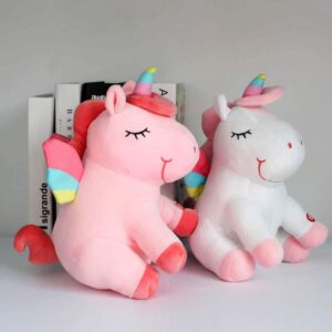 PELUCHES LICORNE LUMINEUSE ROSE ET BLANCHE AILÉE VU DE COTÉ